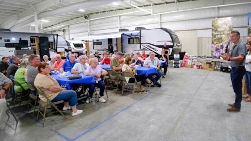 A picture of KZ RV President Ryan Juday addresses attendees of the 2023 owner’s club rally during a luncheon on KZ’s manufacturing campus.