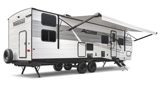 A picture of the exterior of the 2024 Access travel trailer with its awning extended.