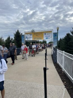 A picture of a long line of consumers waiting to enter America's Largest RV Show in Hershey, Pennsylvania, on the first day of the 2023 show.