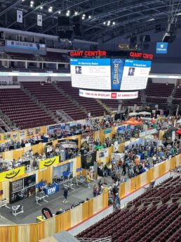 A picture of the crowded exhibitor floor inside the Giant Center at America's Largest RV Show in Hershey, Pennsylvania.