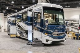 A picture of a 2024 Newmar London Aire motorhome displayed at Newmar's dealer meeting in Colorado Springs, Colorado.