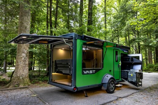 A picture of the SylvanSport Vast adventure trailer with doors and windows opened.