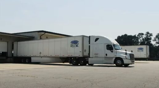A screenshot of a video by Flat World Global on its RVX transportation solution.