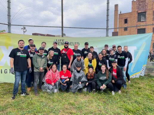 A picture of General RV Center volunteers gathered outside the Detroit area where they volunteered with Life Remodeled to restore a part of the town.