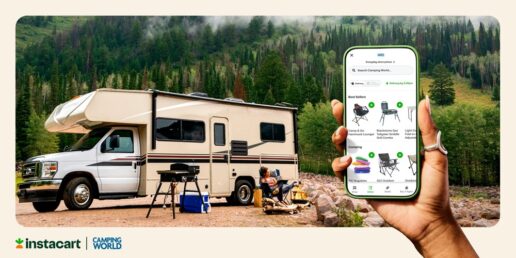A picture of a motorhome parked at a campground with a person holding a mobile phone that shows Instacart's Camping World storefront.
