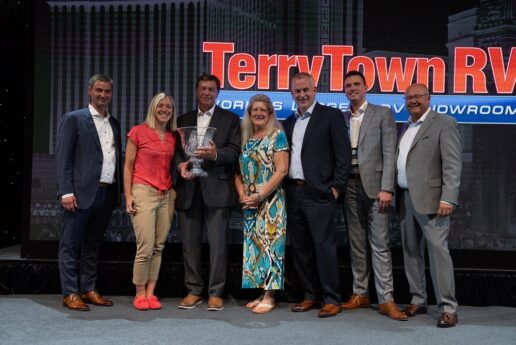 A picture of the Terrytown RV team receiving the 2023 Jayco Founders Award during the Jayco Dealer Homecoming event.