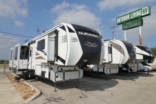 A picture of RVs next to Outdoor Living RV sign.