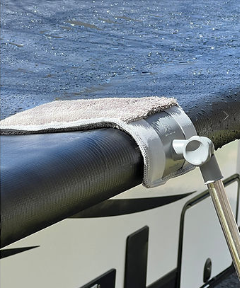 A picture of Trailersphere's Easy Squeegee cleaning an RV awning.