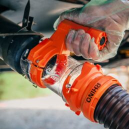 A picture of Camco Rhino 5-inch Clear Sewer Hose Extender with Grip Handle and Light.