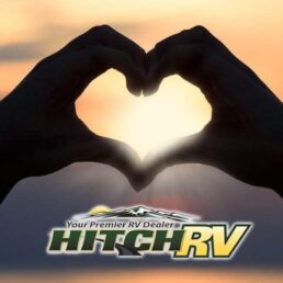 A picture of a Hitch RV graphic showing two hands making a heart above the Hitch RV logo.