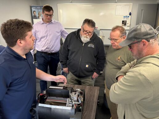 A picture of Truma training staff teaching service technicians.