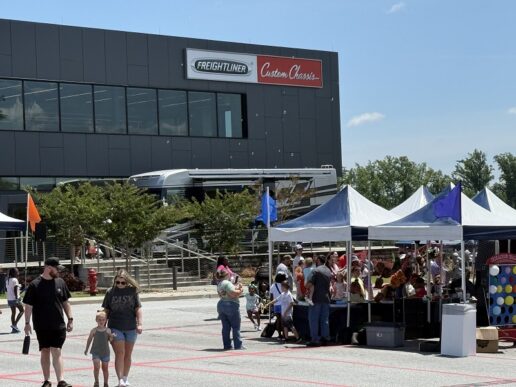 A photo of Freightliner's 30th anniversary celebration, which included carnival games for families of the company's employees.