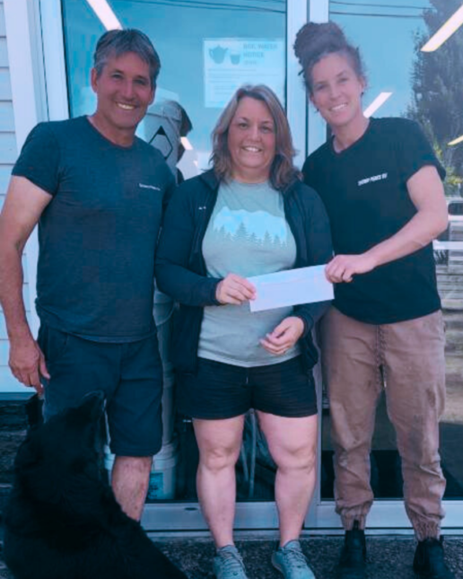 A photo of an RVDA of Canada scholarship recipient receiving a check.