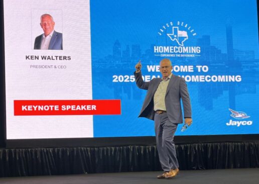 A photo of Jayco President and CEO Ken Walters during his keynote speech at the 2025 Jayco Dealer Homecoming in Texas.
