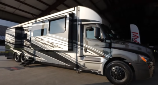 A photo of the exterior of the 2026 Newmar Summit Aire motorhome.
