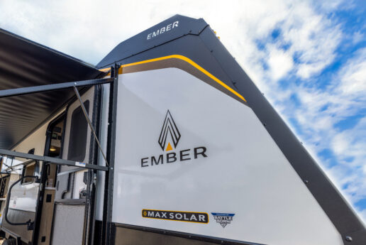 A photo of an Ember RV with the Battle Born Batteries logo on the side.
