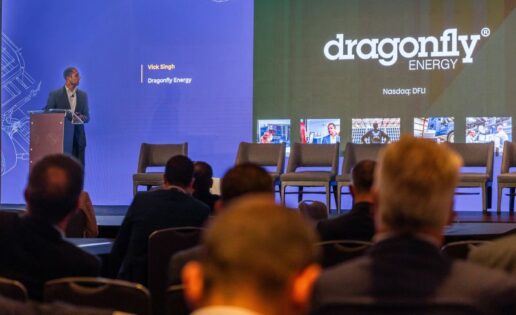 A photo of a Dragonfly Energy representative presenting information at a conference.