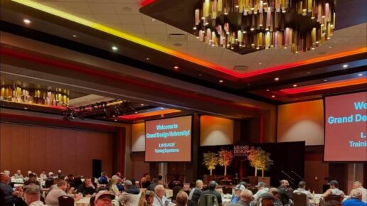 A photo of an event space full of attendees of Grand Design RV's motorized training.