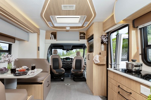 A photo showing the interior of a Leisure Travel Vans Desert Shadow Edition