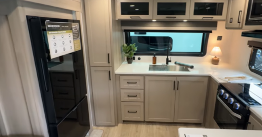 A photo of the kitchen in the Rockwood Mini Lite 2523MBR.