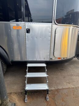 A photo of the GlowStep Revolution steps for Airstream Basecamp travel trailers.
