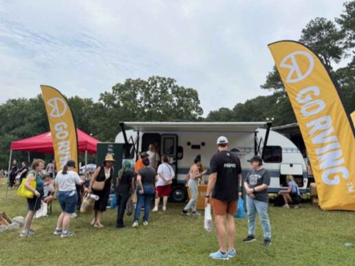 A photo of people looking at an RV during one of Go RVing's experiential events.