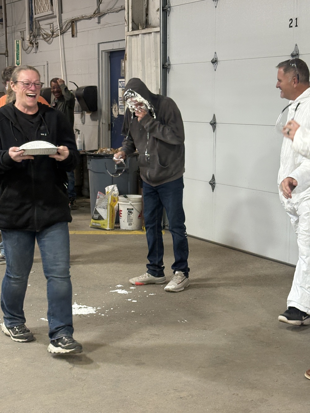 A member of Coachmen RV's Plant 210 is pictured after taking a pie to the face.