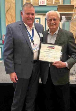 A photo of PRVN President Mike Regan and retiring PRVN Financial Advisor Hardee McAlhaney (right).