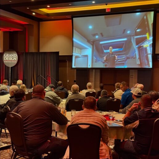 A picture of a video shown to attendees of Grand Design University's motorized dealer training.