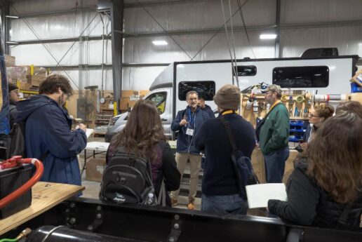 A photo of a group of RV dealer going through 2025 Jayco MASTER training.