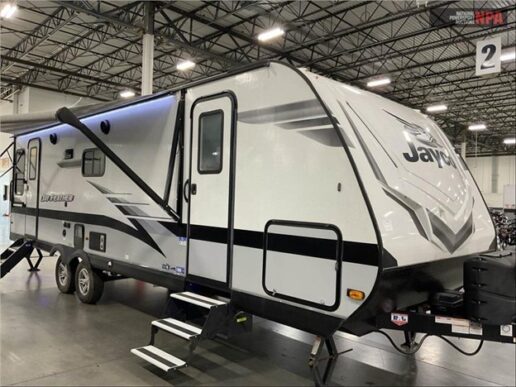 A photo of a Jayco Jay Feather M 26RL travel trailer.