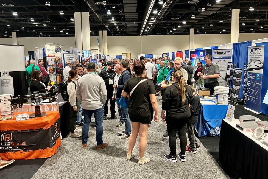 Attendees walk the show floor at the 2026 NTP-Stag Expo in Kissimmee, Florida.
