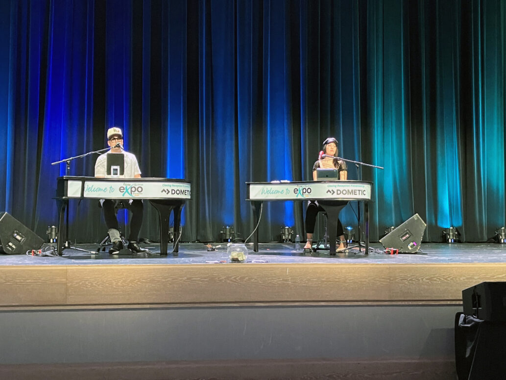A picture of the dueling piano entertainers playing songs for attendees at the Closing Reception of the 2026 NTP-Stag Expo in Kissimmee, Florida.