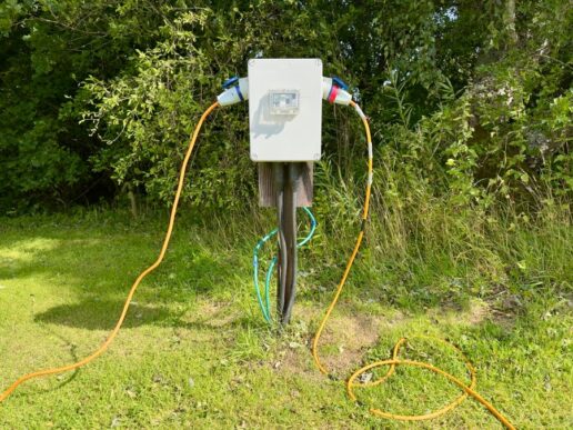 A stock image of an RV park and campground electricity pedestal.