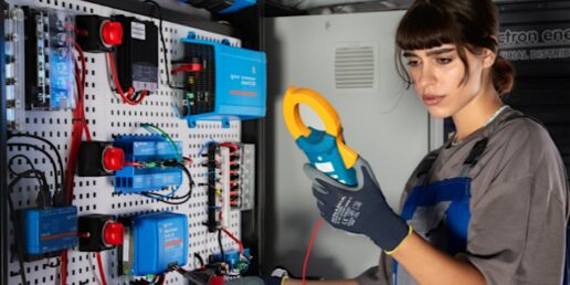 A photo of a woman going through RV technician training.