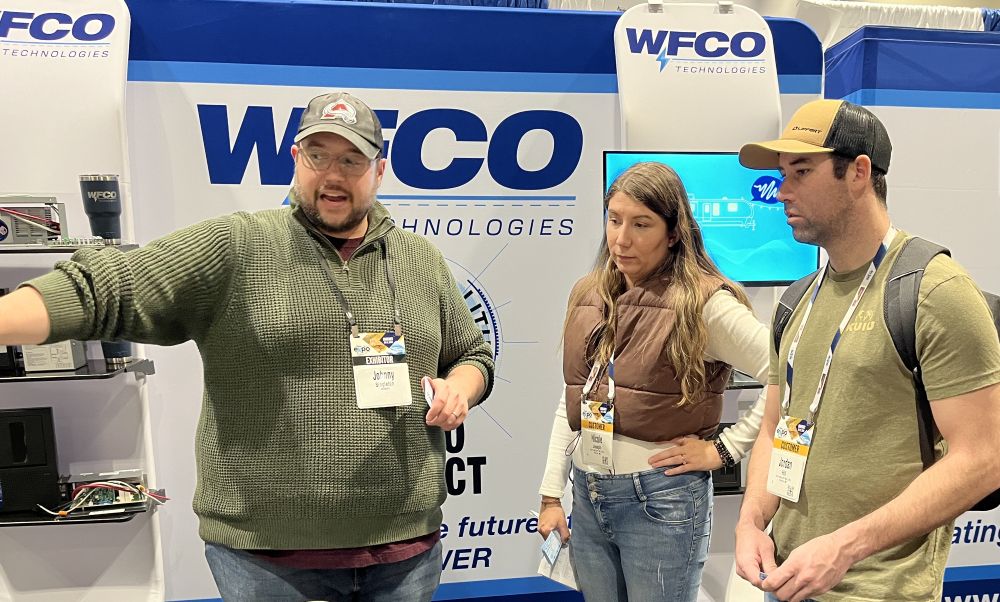 A photo of customers in the WFCO booth at the NTP-Stag Expo.