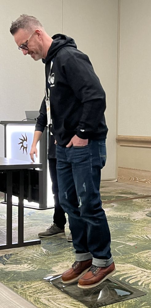 A photo of Justin Beaudry standing on an Icon skylight.