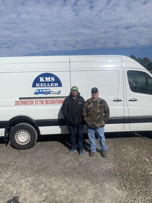 A picture of (L to R) Berryland Campers Parts Manager Michael Gisse accepting a delivery from Keller Marine & RV driver Joel Cambetta. The delivery is Keller’s first from its Hammond, Louisiana, warehouse.