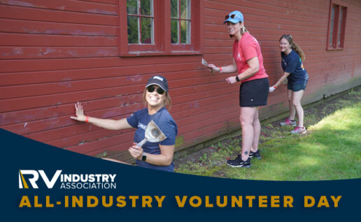 A photo showing three volunteers painting an exterior wall during the RVIA's annual Park Improvement Project all-industry volunteer day.