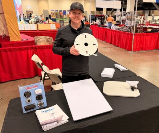 Cameron Stout, Territory Manager at TCM Sales, at the 2026 Seattle RV Show showcasing the Seaview range of RV products.